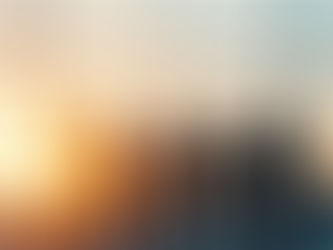 Business people silhouetted in office window looking at sunset city, representing leadership, success, and teamwork