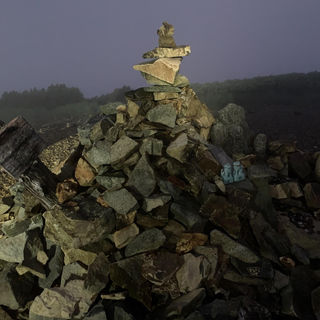 A rocky cairn adorns the summit of Mt. Hiuchi