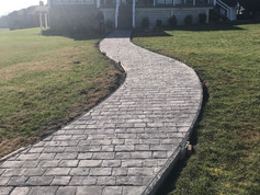 Stamped sidewalk down to the lake