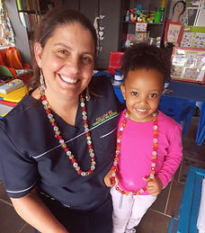 picture of teacher fatima with student at follow me