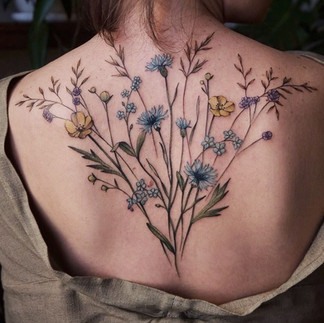 квіткові тату на спині