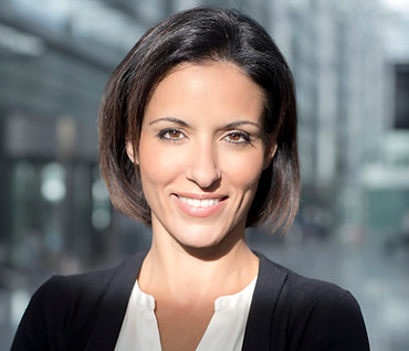 “Grandcrest team member in business attire during consultation session”