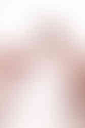 bride twirling her dress at double arch overview