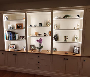 Bespoke display cabinet with illuminated shelving