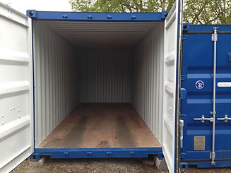 1. Empty storage container with doors open for loading