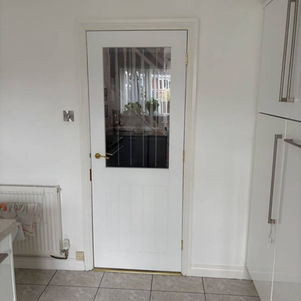 White interior door with glazed upper panel