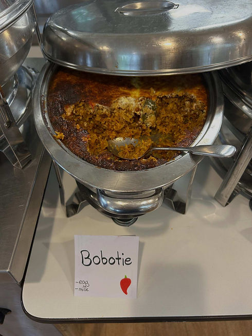 Traditional bobotie served in a buffet warmer