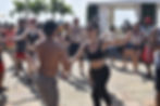 Salsa dancing at a pool party in Miami, Florida.