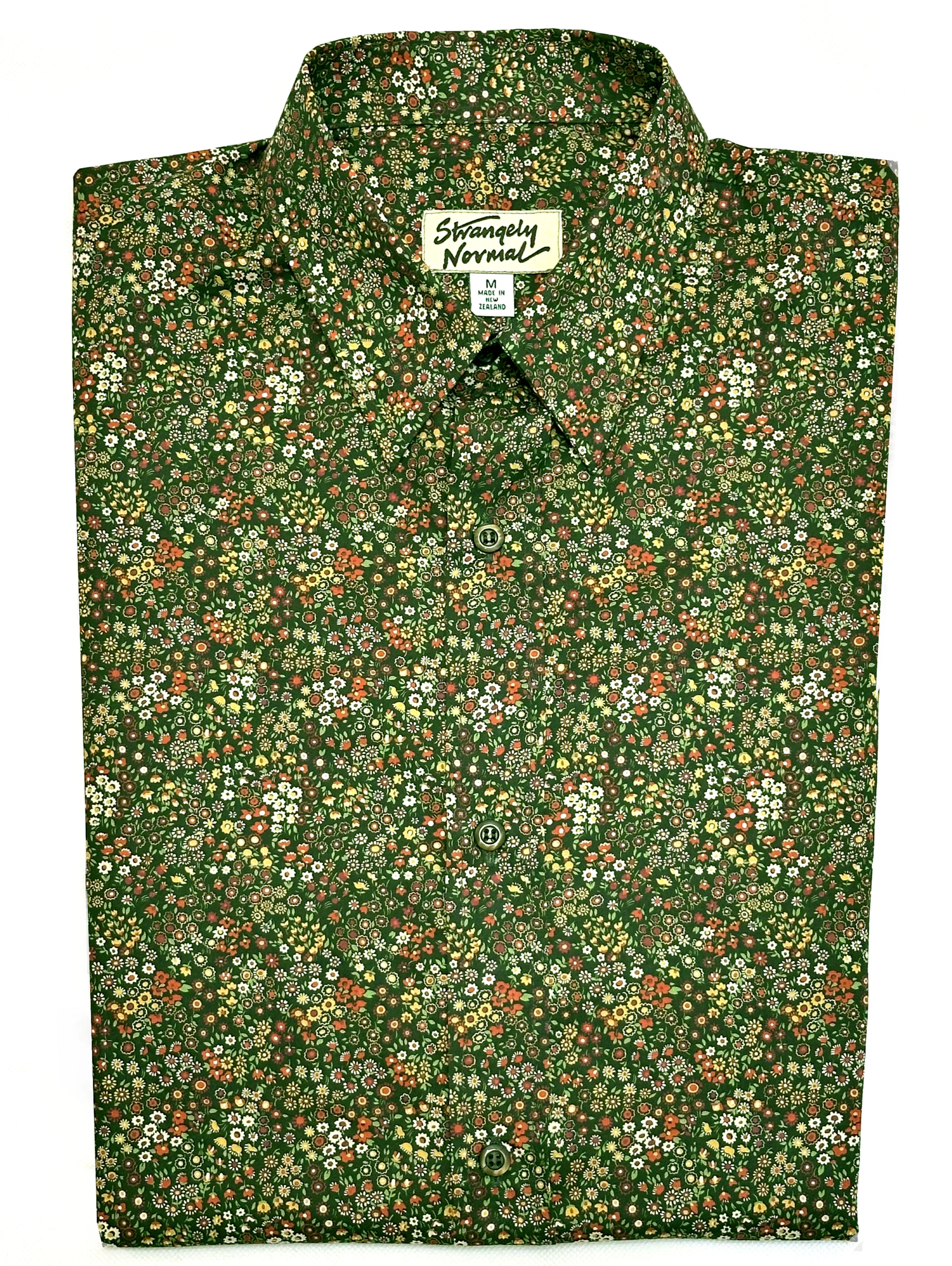 tiny flowers on a dark green background