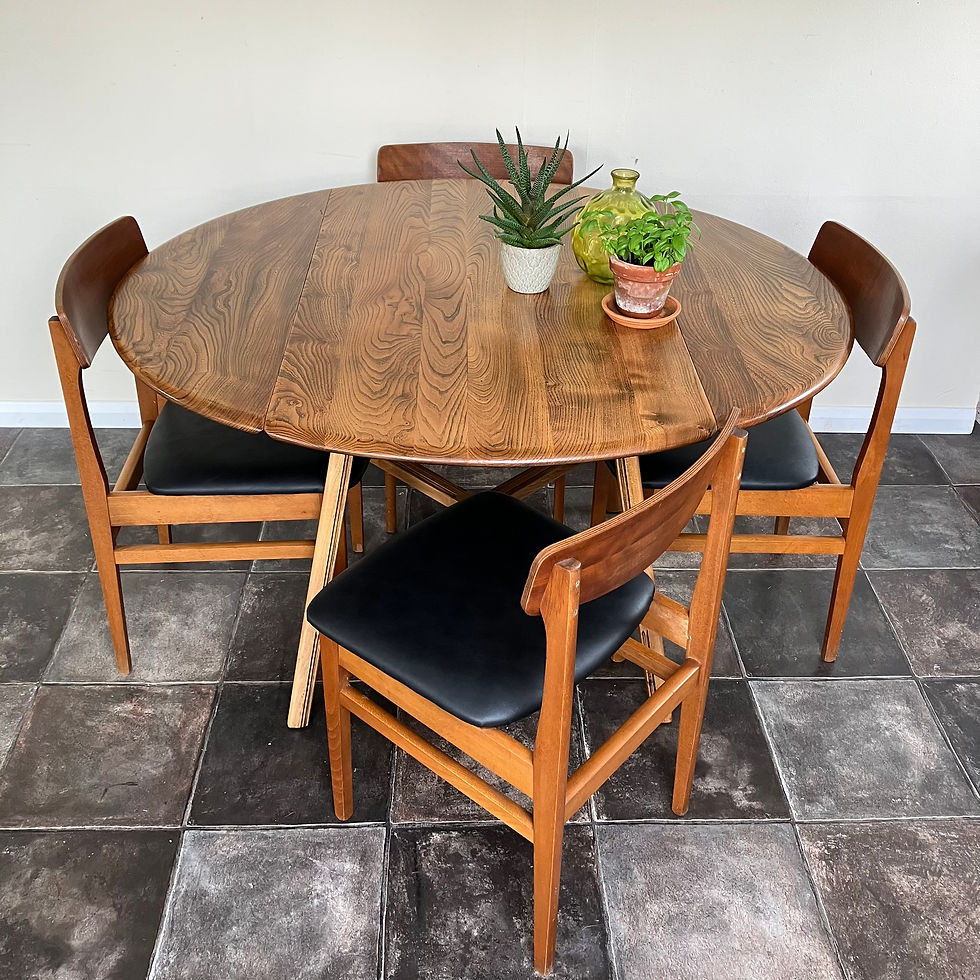 Thumbnail: Mid Century Ercol '377' 1950's Solid Elm Drop Leaf Oval Dining Table with Butterfly Back Teak Dining Chairs by Ligna
