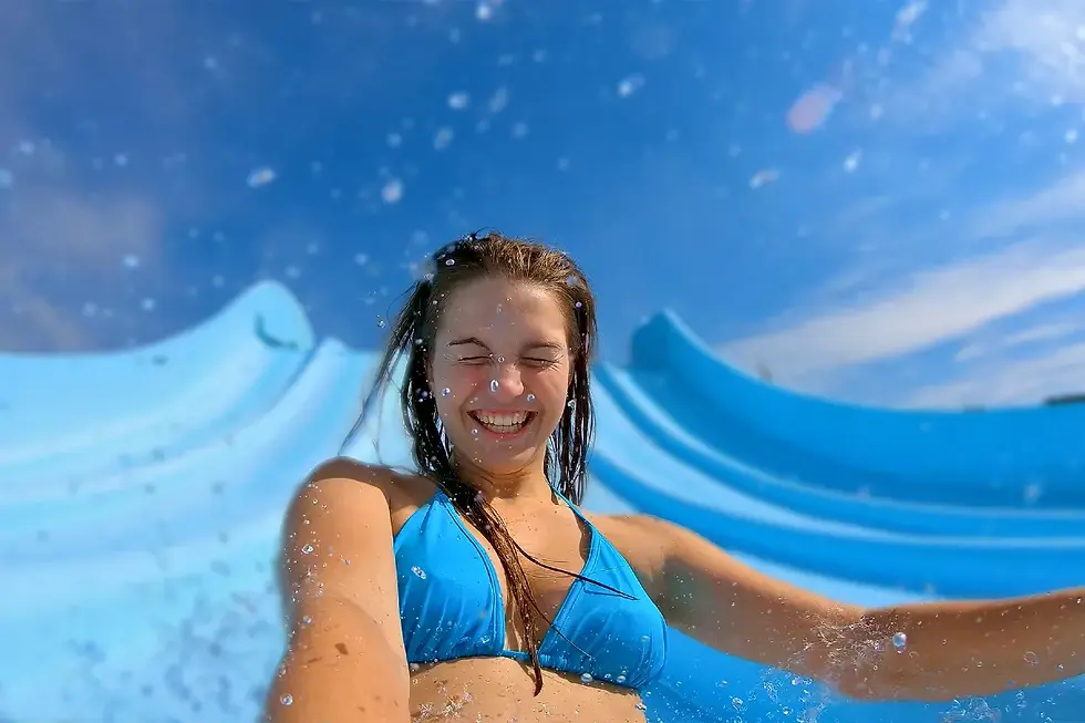 woman-water-slide-adult-fun-KUZA-Deluxe-Pass-Water-Park-Adventure-cozumel