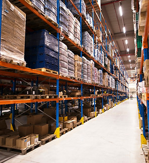 interior-large-distribution-warehouse-with-shelves-stacked-with-palettes-goods-ready-marke