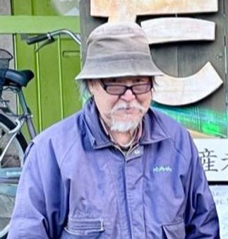 社長木村章二が微笑んでいる