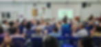 High angle view of congregants gathered in a church hall