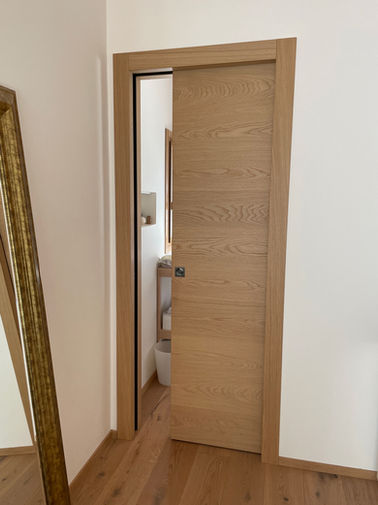 porta interna scorrevole, porta interna scorrevole interno muro, porta in rovere, porta scorrevole in rovere