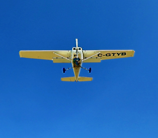 white%20monoplane%20on%20flight_edited_edited.png