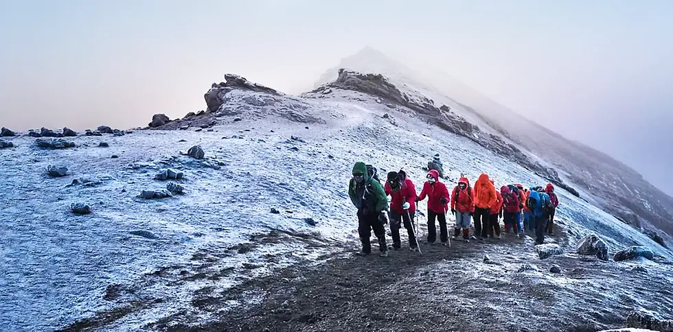 Climbers trekking on kilimanjaro galciers