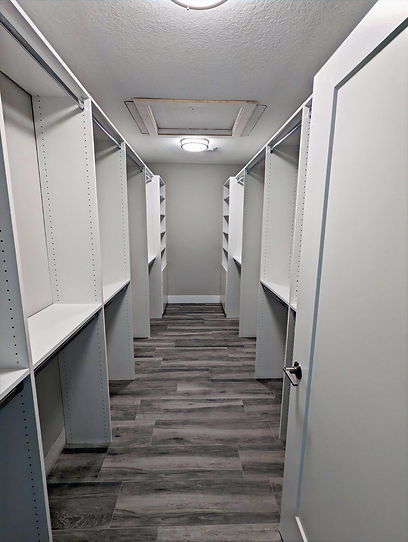 Custom Storage Closet with High and low Hanging Rods