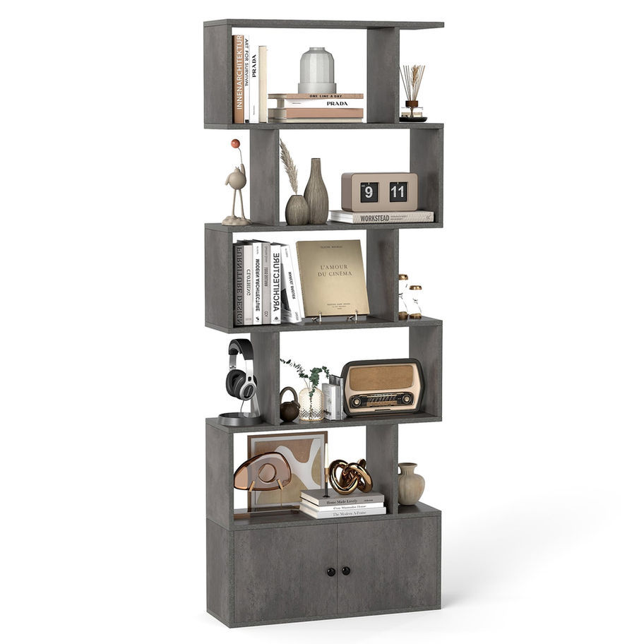 Grey S-shaped shelving unit with books and decor