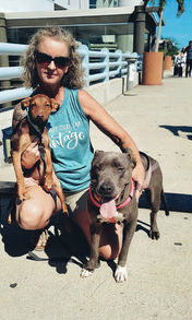 Woman adopting Mexican dogs