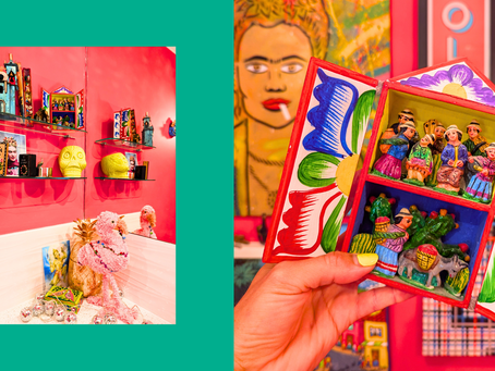 Handmade Peruvian retablo featuring a market scene in a colourful folk art box