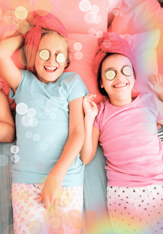 Two girls lie back with hair in a towel wrap and cucumbers on eyes enjoying the ultimate pamper party