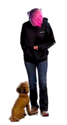 Trainer building engagement, communication, and trust with a puppy during balanced dog training in Missoula, Montana.