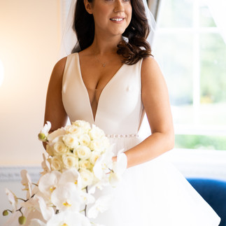 Bride posing in her dress