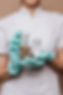 Canva - Woman Holding Two Clear Bottles