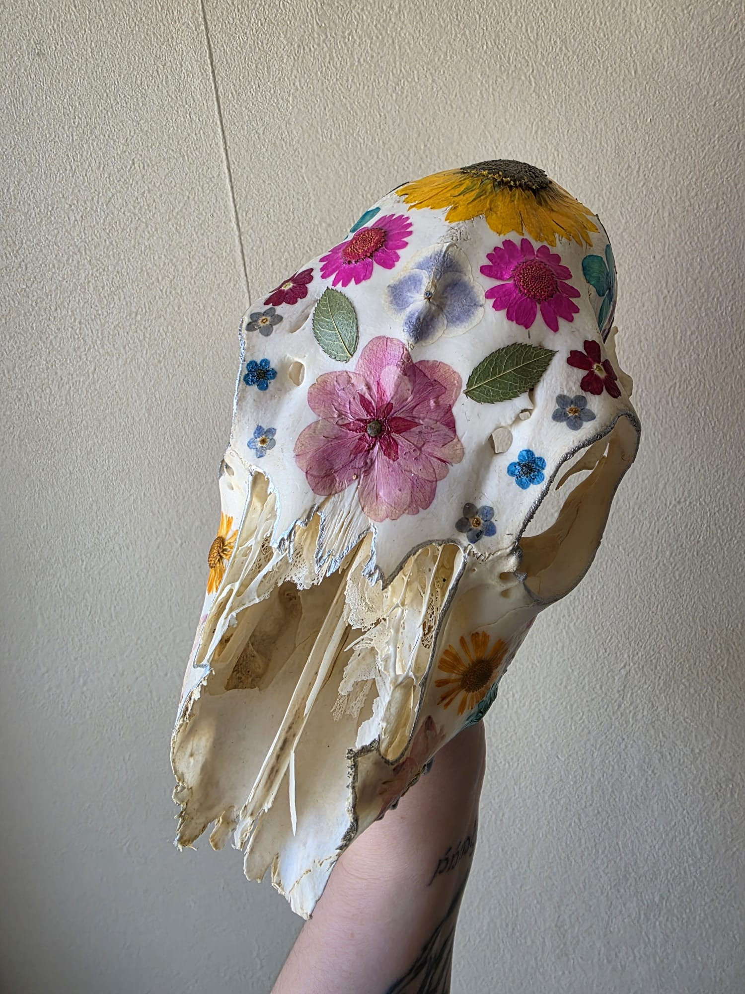 Decorated doe skull with dried florals