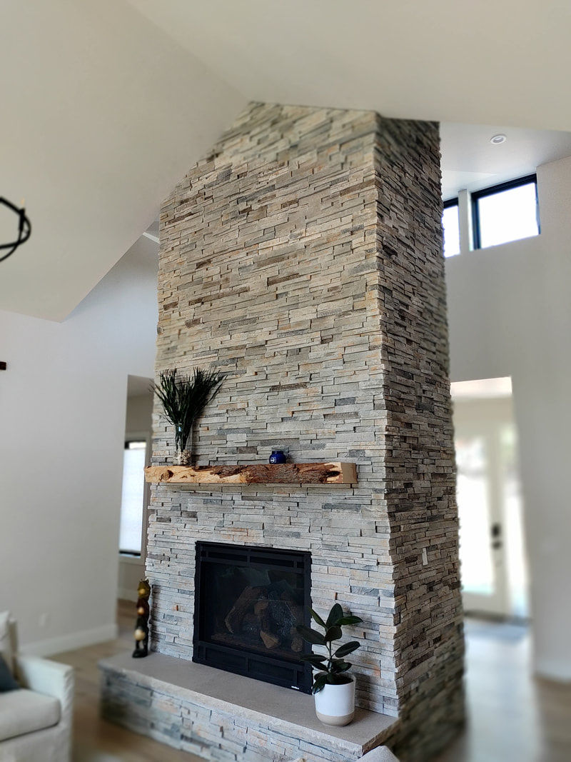 Elegant stone fireplace, Heartstone Custom Homes North Idaho