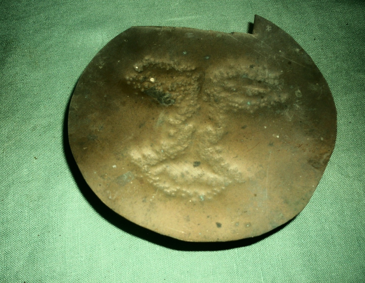 Max K Elias sculpture:  Male Face in Beaten Copper