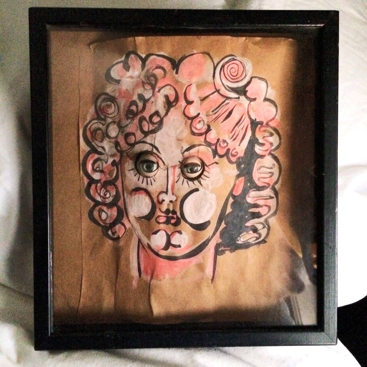 Max K Elias sculptural collage: Face with Doll Eyes