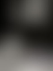 A child draws a chalk rainbow outside First Avenue, Minneapolis, April 23 2016, two days after Prince's death. Photograph by Timothy Harmon.