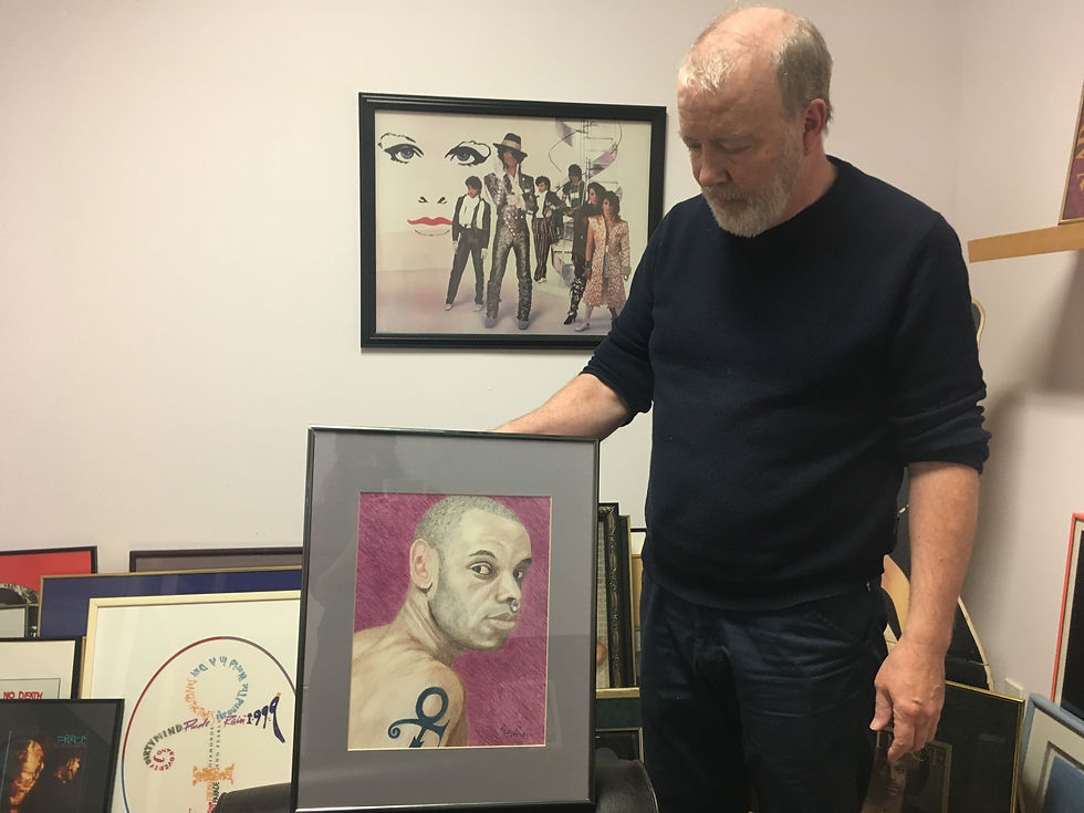 Kevin Nickelson with portrait of e.