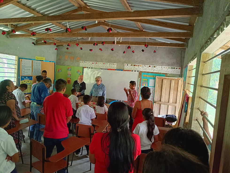 Meeting in Las Vegas del Corozal, May 2024, evaluating the completion of the water system project.