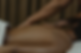 Image of a woman of color receiving medical qi gong by a practitioner at Hidden Root Acupuncture