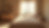 Eye-level view of a massage table set up in a calm, softly lit room