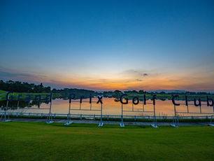 Sunset over Grand Prix Golf Club lake