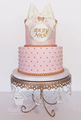Pink and gold baby girl shower cake
