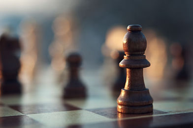 Close-up-of-chess-pieces-on-a-chessboard.jpg