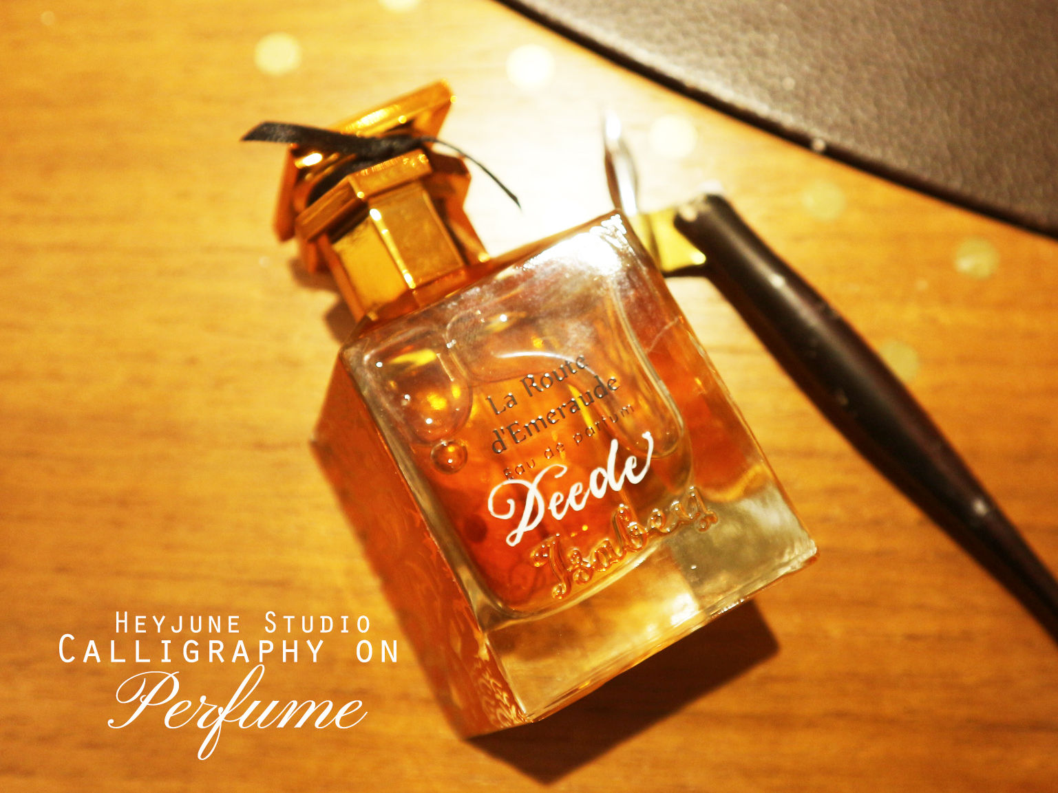 CALLIGRAPHY ON PERFUME BOTTLE