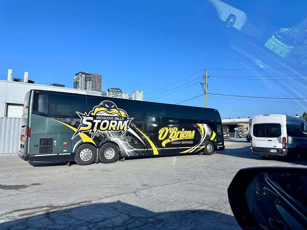 Eye-level view of the new Iroquois Falls Storm Prévost coach bus parked at the arena