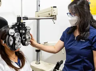 an eye doctor and a patient at Eyellusion NYC