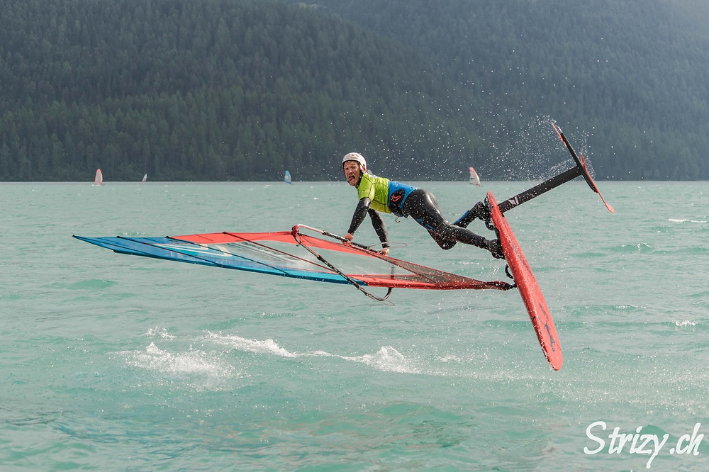 Balz Müller upside down jumping on his windfoil Lokefoil at Silvaplana