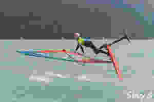 Balz Müller upside down jumping on his windfoil Lokefoil at Silvaplana