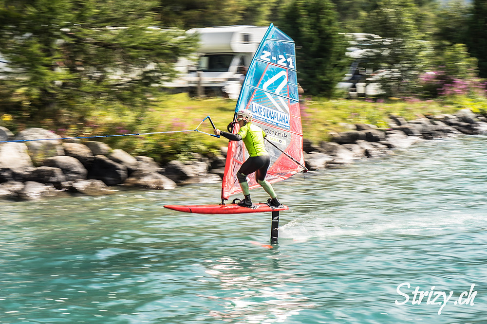 Tow-in windfoiling! by Balz Müller in Silvaplana