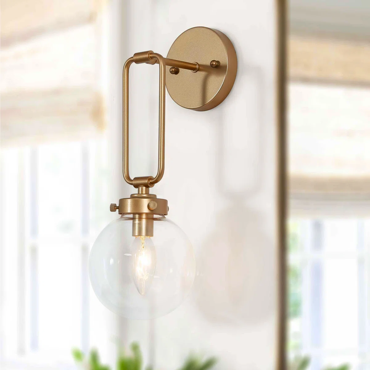 Modern glass and brass sconces
