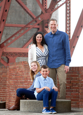 family portrait under the golden gate bridge