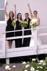 bride and bridesmaids cheering at wedding